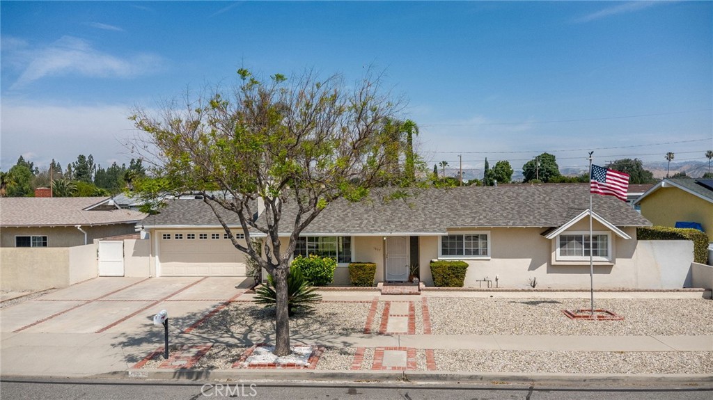 1607 Blackwall Drive Simi Valley, CA 93063 - Photo 41 of 47 a front view of a house with a yard and garage