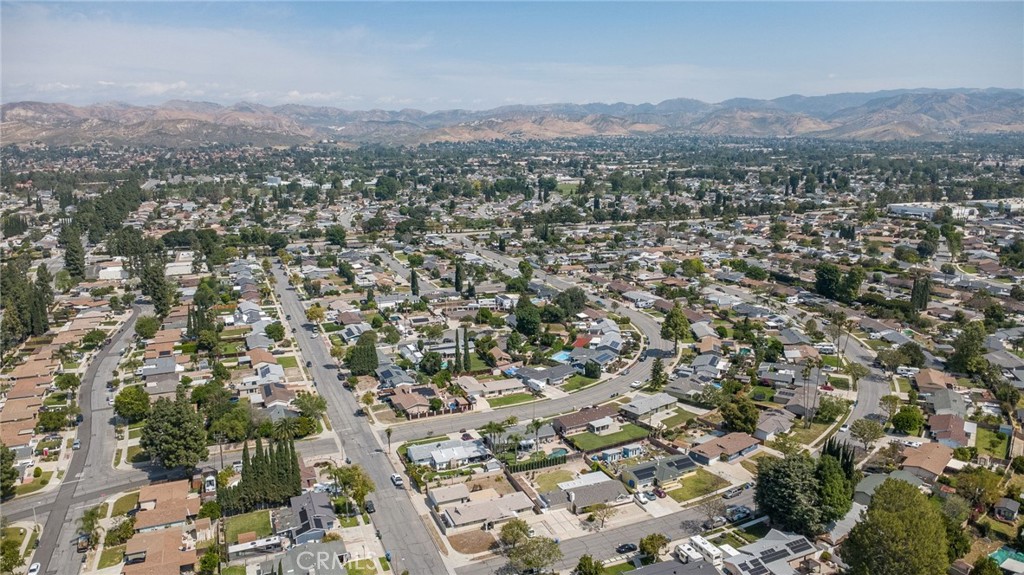 1607 Blackwall Drive Simi Valley, CA 93063 - Photo 44 of 47 an aerial view of residential house with parking and mountain view