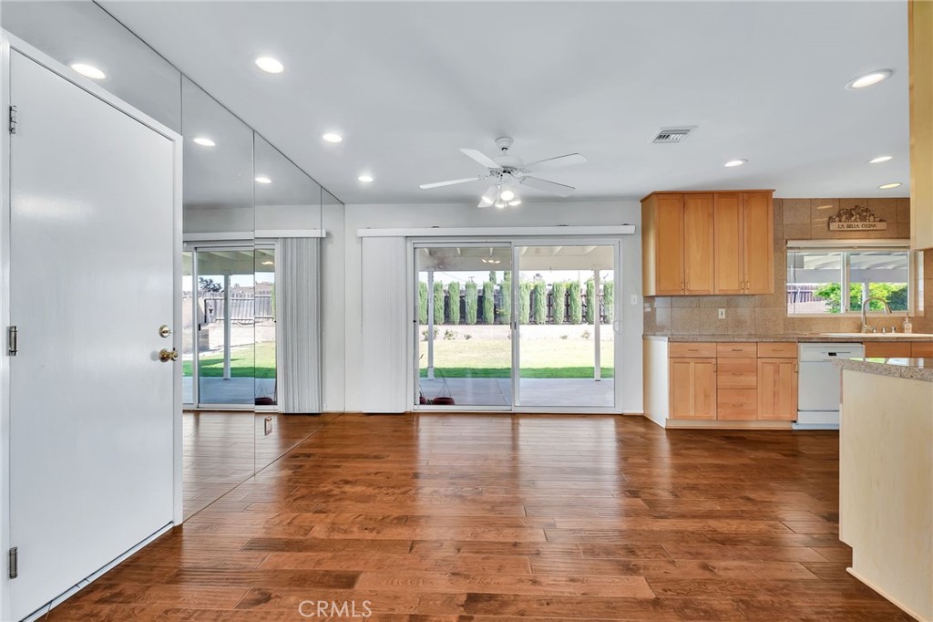 1607 Blackwall Drive Simi Valley, CA 93063 - Photo 9 of 47 a view of an empty room with wooden floor and a window