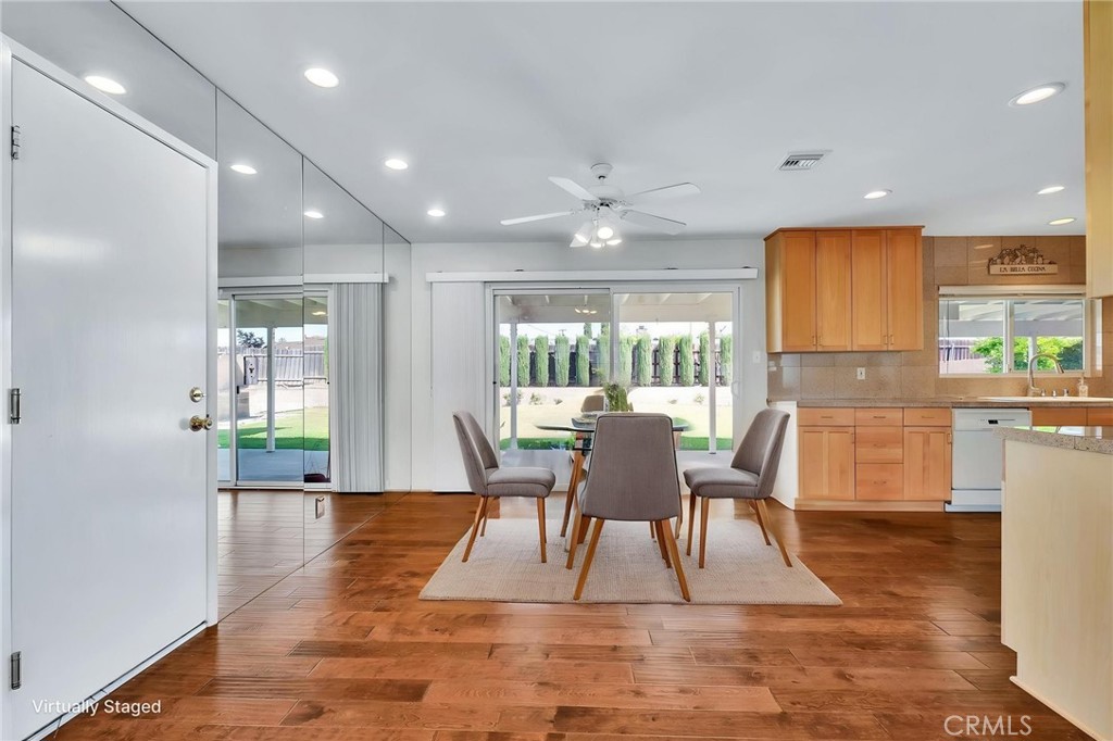 1607 Blackwall Drive Simi Valley, CA 93063 - Photo 10 of 47 a view of a dining room with furniture and wooden floor