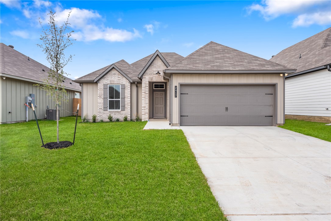 a view of outdoor space yard and garage