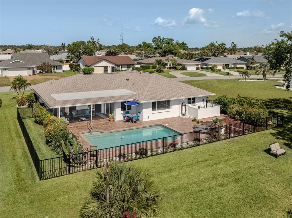 1232 Pine Needle Road Venice, FL 34285 - Photo 2 of 91 an aerial view of a house with garden space and street view