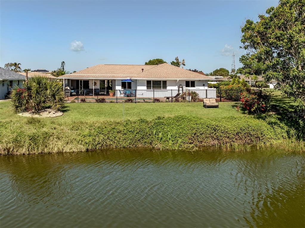 1232 Pine Needle Road Venice, FL 34285 - Photo 41 of 91 a front view of a house with a ocean view