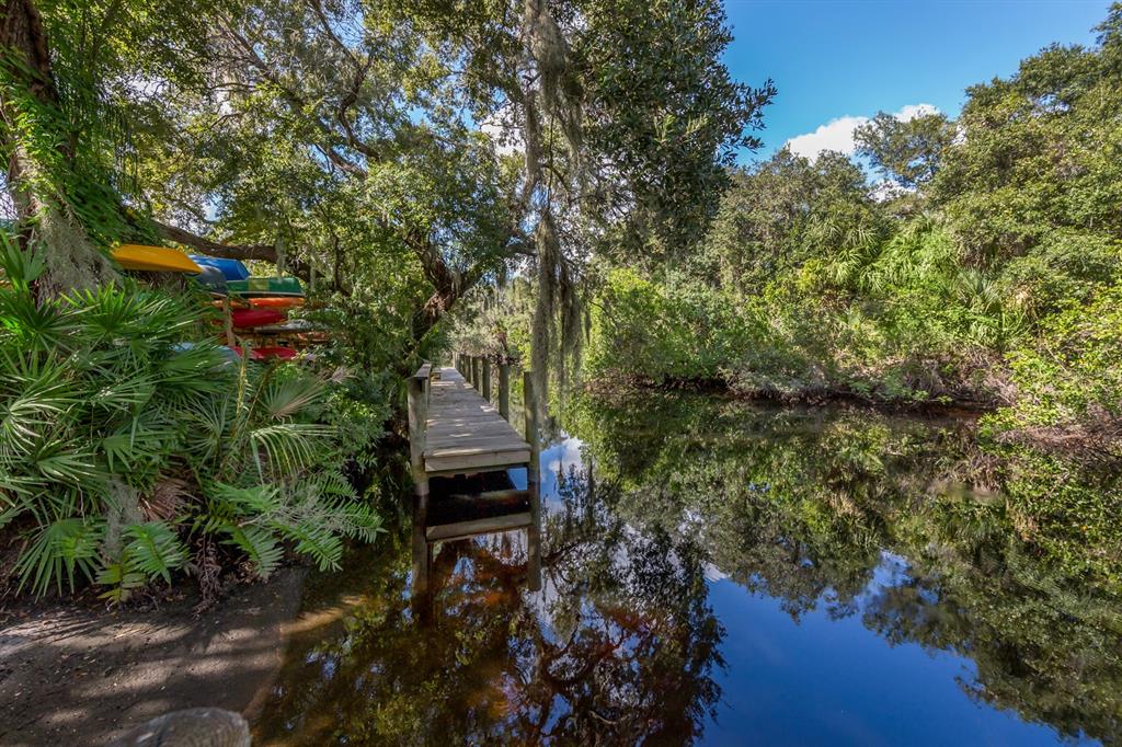 1232 Pine Needle Road Venice, FL 34285 - Photo 54 of 91 a view of a house with a yard
