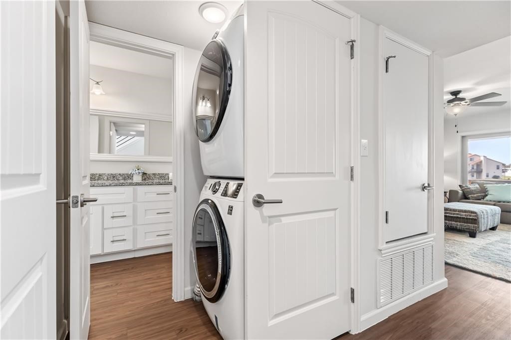 620 Fulton Beach Road, Unit 308 Rockport, TX 78382 - Photo 15 of 30 a view of a bedroom with washer and dryer