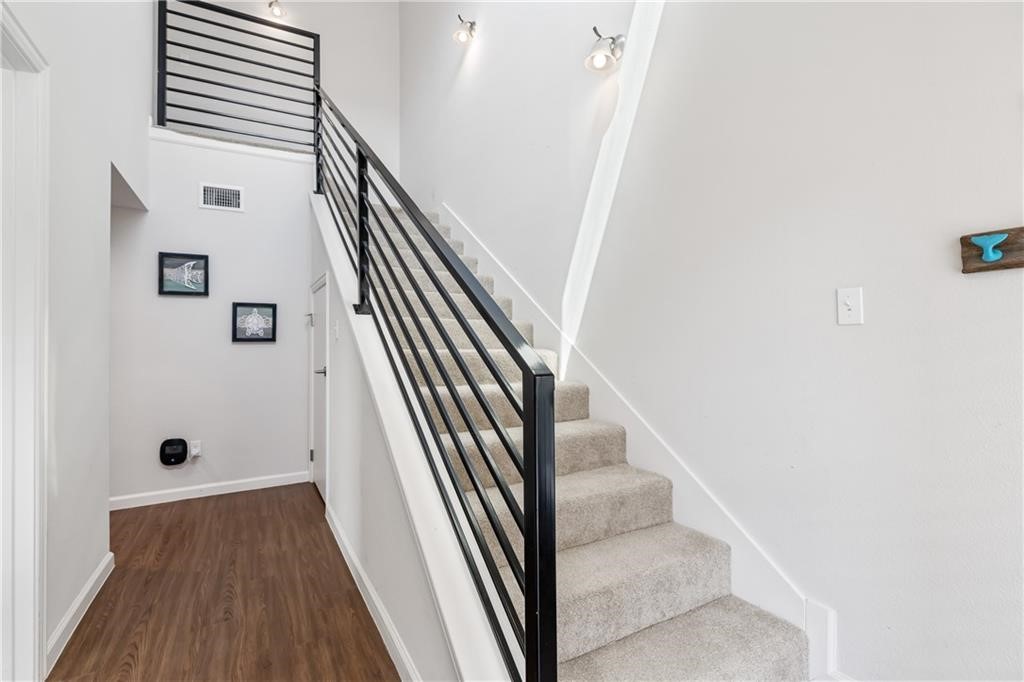 620 Fulton Beach Road, Unit 308 Rockport, TX 78382 - Photo 16 of 30 a view of entryway and hall with wooden floor