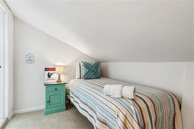 a bedroom with a bed and closet