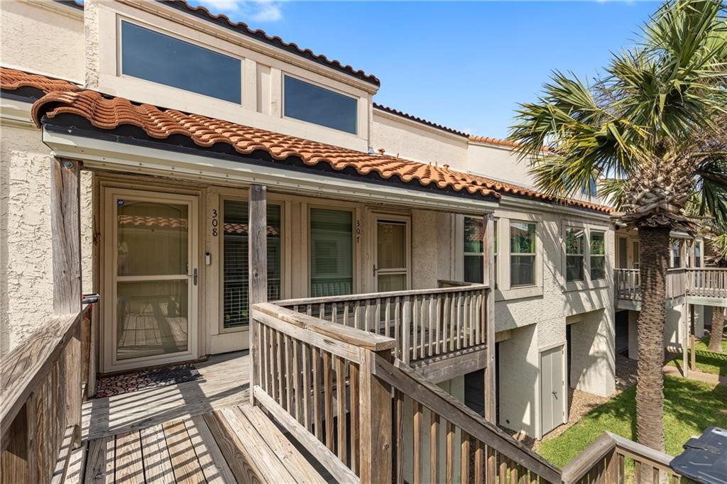 620 Fulton Beach Road, Unit 308 Rockport, TX 78382 - Photo 2 of 30 front view of a house with a deck
