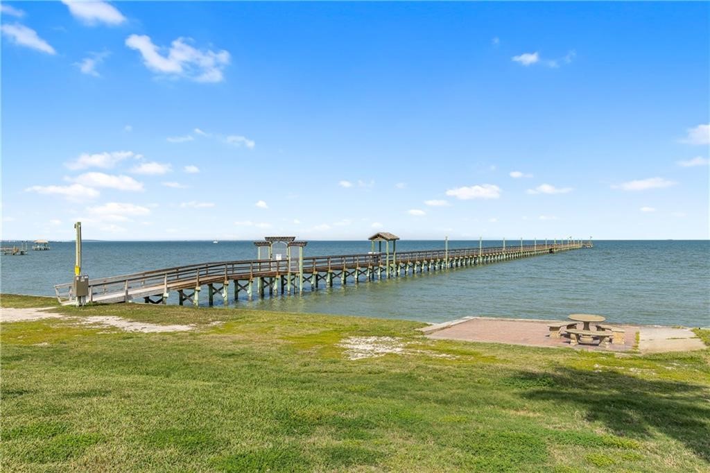 620 Fulton Beach Road, Unit 308 Rockport, TX 78382 - Photo 29 of 30 a view of a swimming pool with an ocean view
