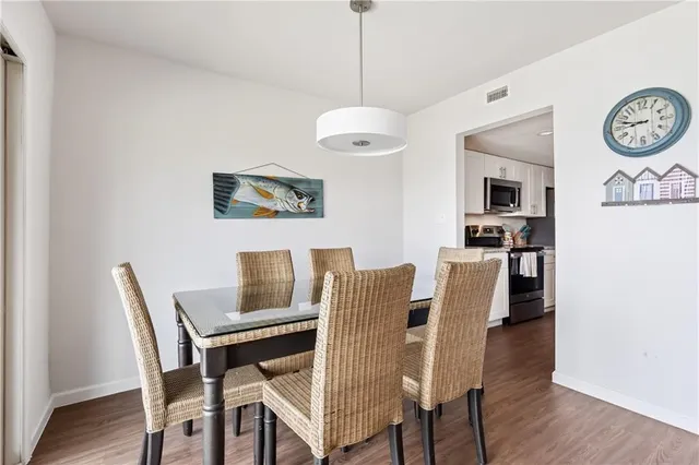 a view of a dining room with furniture