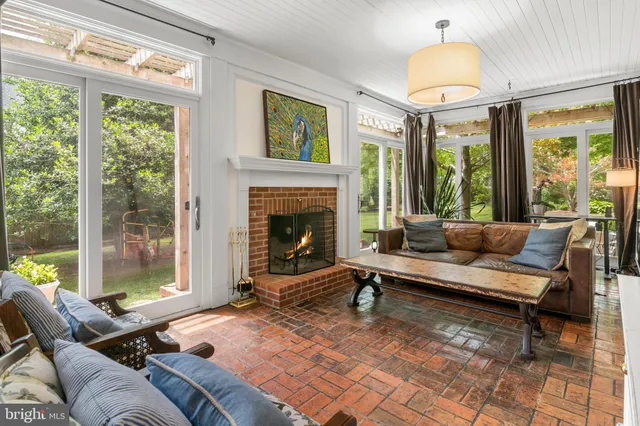 a kitchen with stainless steel appliances granite countertop a refrigerator a stove and a sink