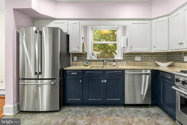 a bedroom with a bed and a cabinets