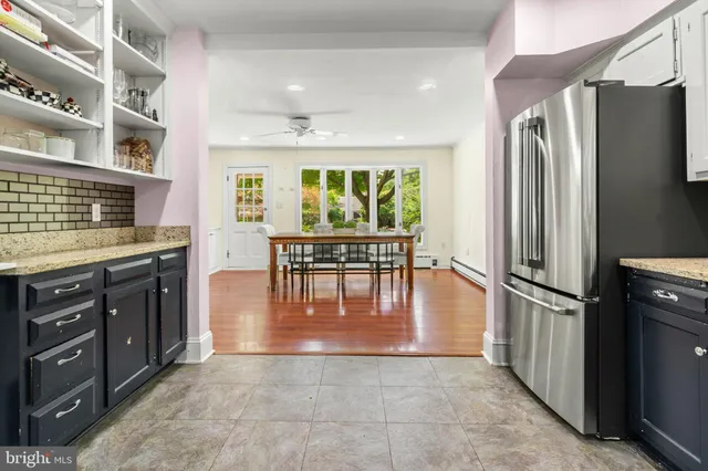 a bathroom with a sink a mirror and vanity
