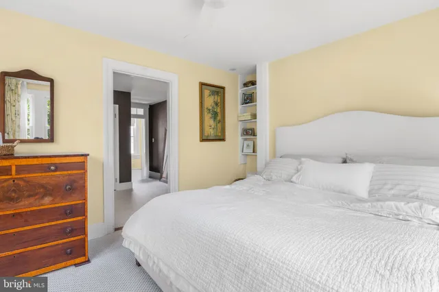 a bathroom with a tub sink and window