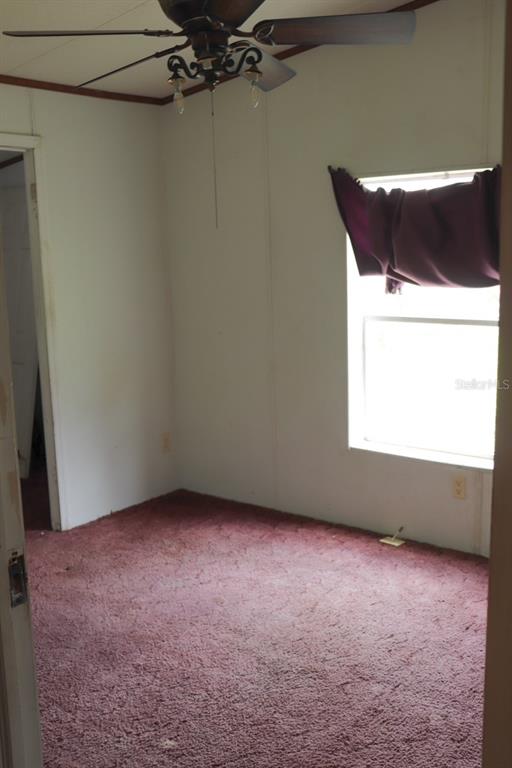 448 Fernandez Street Winter Haven, FL 33880 - Photo 13 of 27 an empty room with a window