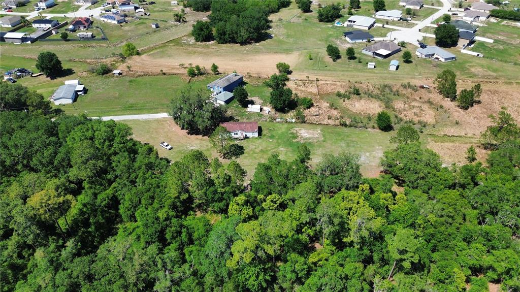 448 Fernandez Street Winter Haven, FL 33880 - Photo 22 of 27 a view of a lake with a park