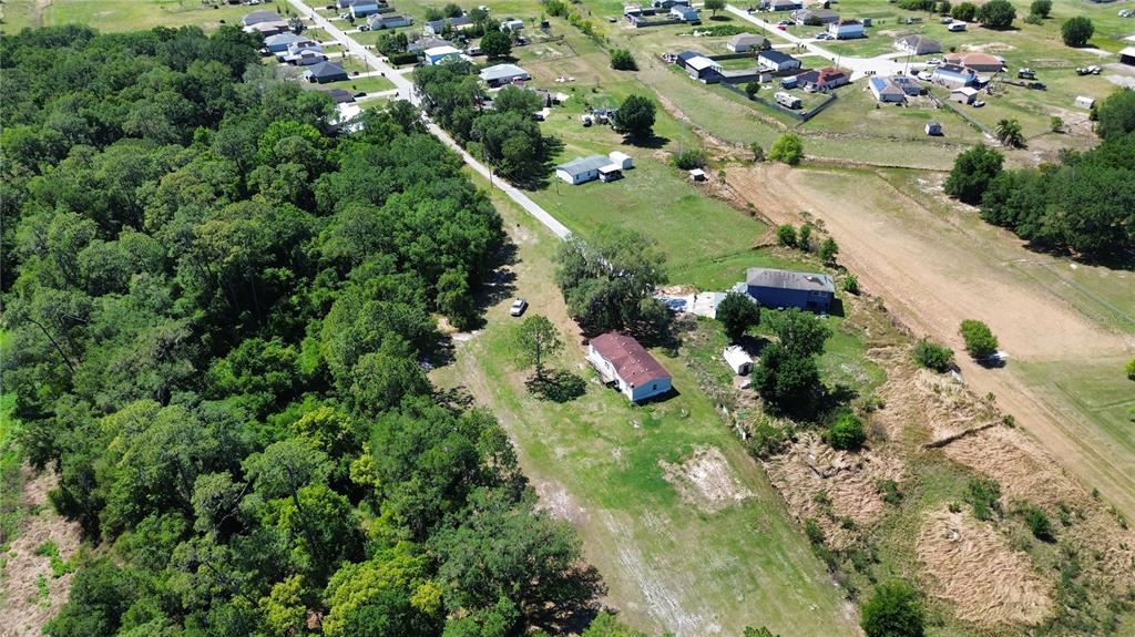 448 Fernandez Street Winter Haven, FL 33880 - Photo 23 of 27 an aerial view of a house with a yard