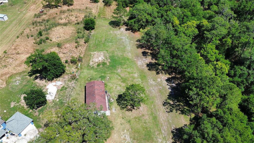 448 Fernandez Street Winter Haven, FL 33880 - Photo 24 of 27 an aerial view of a yard