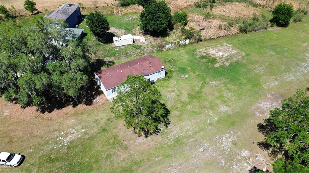 448 Fernandez Street Winter Haven, FL 33880 - Photo 26 of 27 an aerial view of residential house with yard and lake view in back