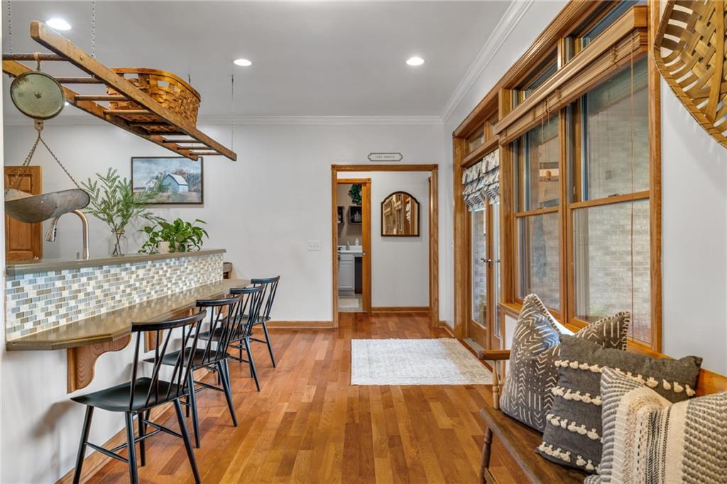 764 Old Millcreek Road Hookstown, PA 15050 - Photo 14 of 48 a dining room with furniture and a floor to ceiling window