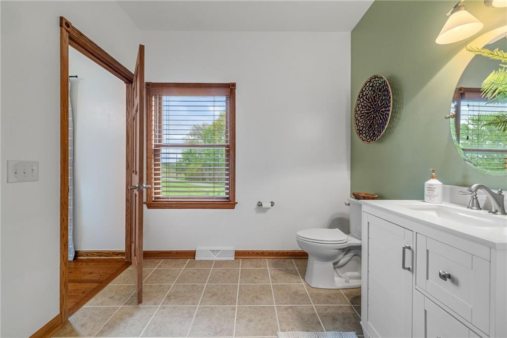 764 Old Millcreek Road Hookstown, PA 15050 - Photo 21 of 48 a bathroom with a toilet a sink and a mirror