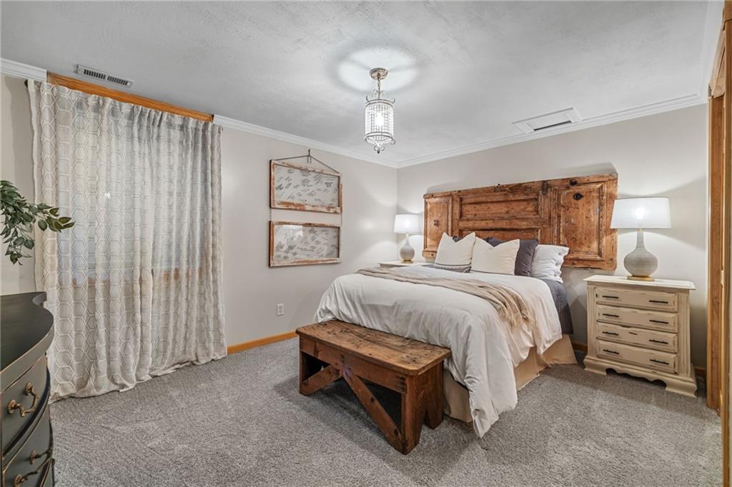 764 Old Millcreek Road Hookstown, PA 15050 - Photo 34 of 48 a bedroom with a bed and a dresser