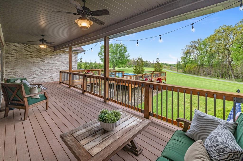 764 Old Millcreek Road Hookstown, PA 15050 - Photo 36 of 48 a view of a balcony with wooden floor and outdoor seating