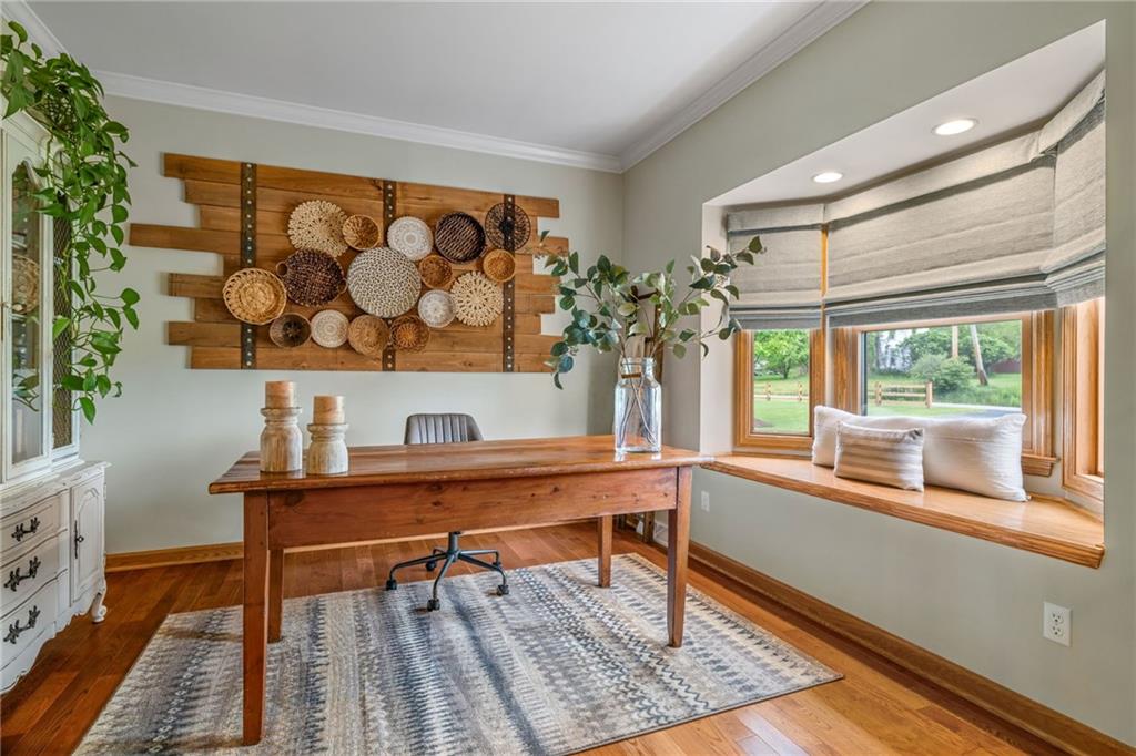 764 Old Millcreek Road Hookstown, PA 15050 - Photo 5 of 48 a room with a table and a potted plant
