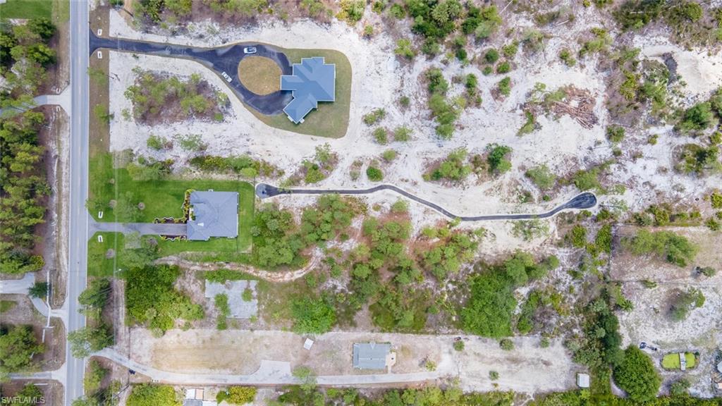2572 Randall Boulevard Naples, FL 34120 - Photo 43 of 45 an aerial view of a house