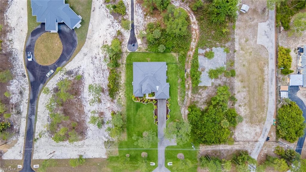 2572 Randall Boulevard Naples, FL 34120 - Photo 44 of 45 an aerial view of a swimming pool