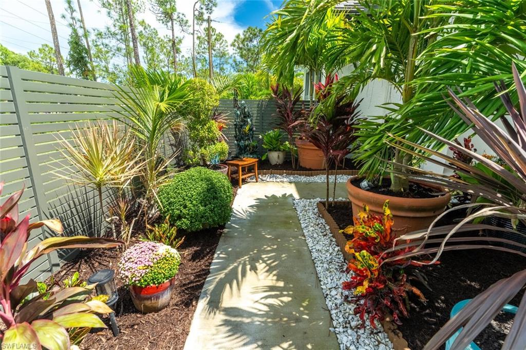 2572 Randall Boulevard Naples, FL 34120 - Photo 6 of 45 a view of a backyard of the house