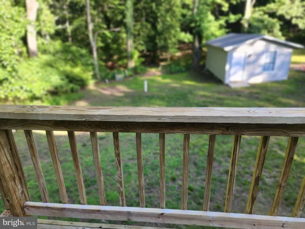a view of a wooden fence