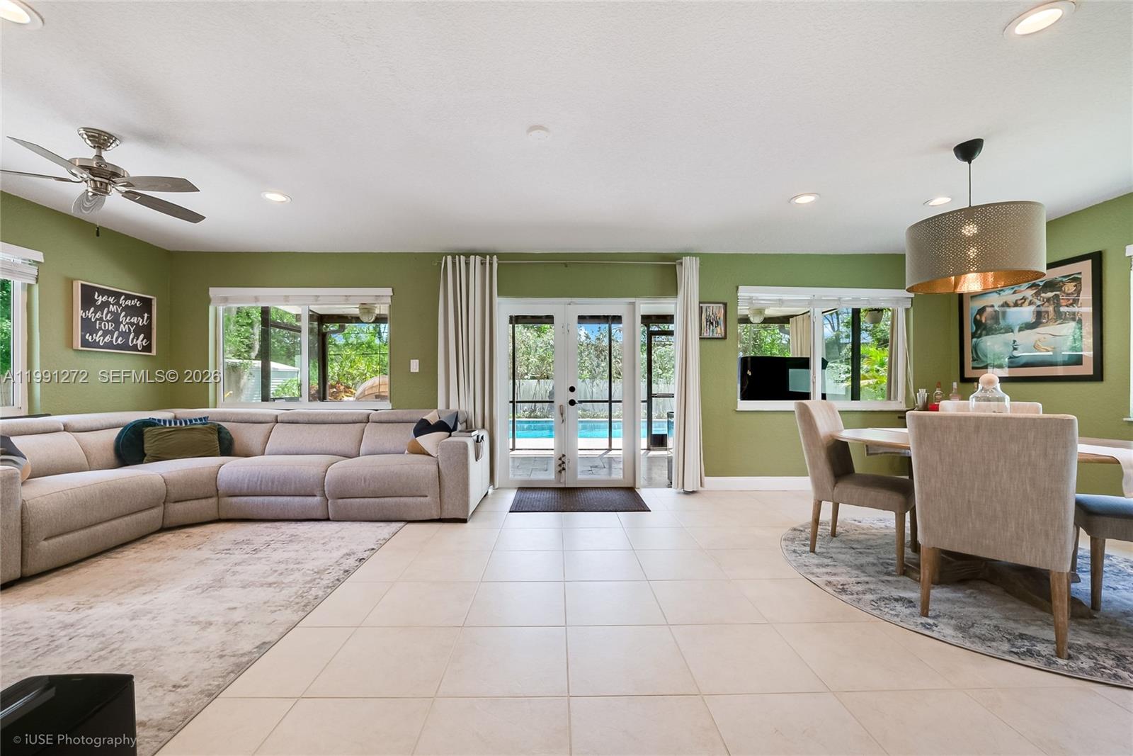 8535 Southwest 97th Road Miami, FL 33173 - Photo 8 of 28 a living room with furniture and a large window