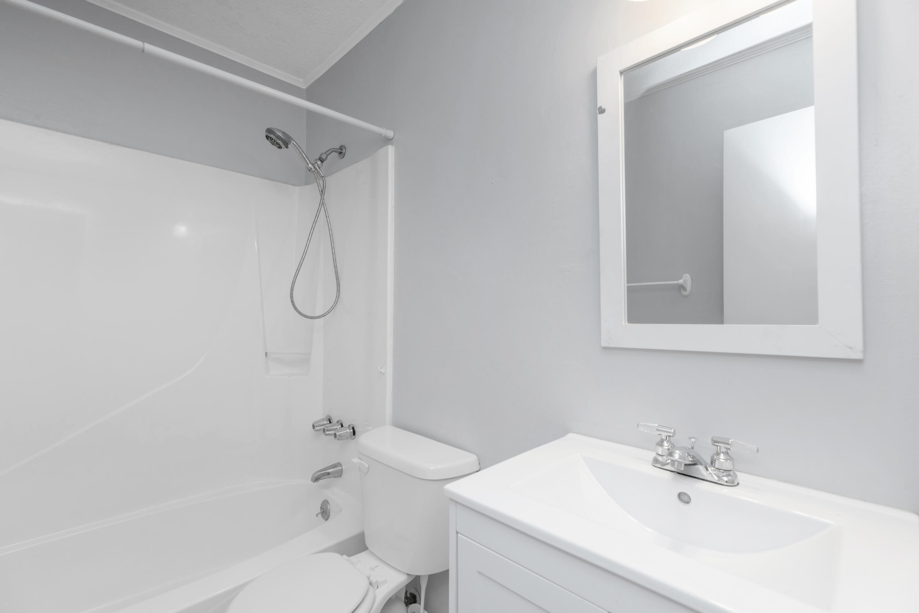 5825 Old Bethel Road Crestview, FL 32536 - Photo 21 of 44 a bathroom with a sink a toilet and shower