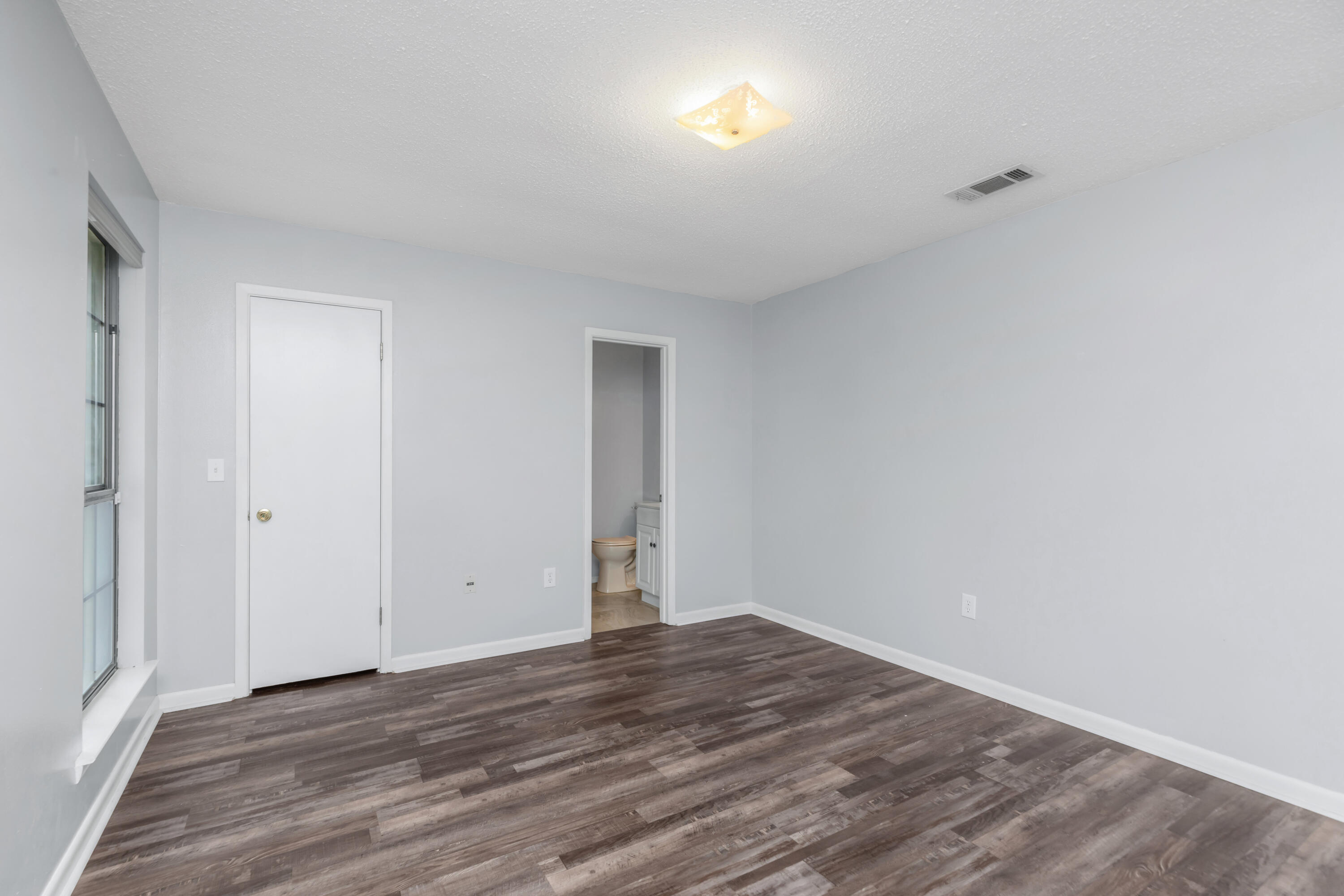5825 Old Bethel Road Crestview, FL 32536 - Photo 7 of 44 a view of an empty room