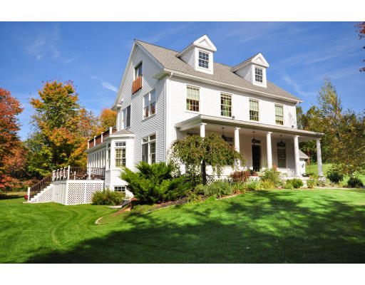 100 Nourse Road Bolton, MA 01740 - Photo 1 of 1 a front view of a house with a yard