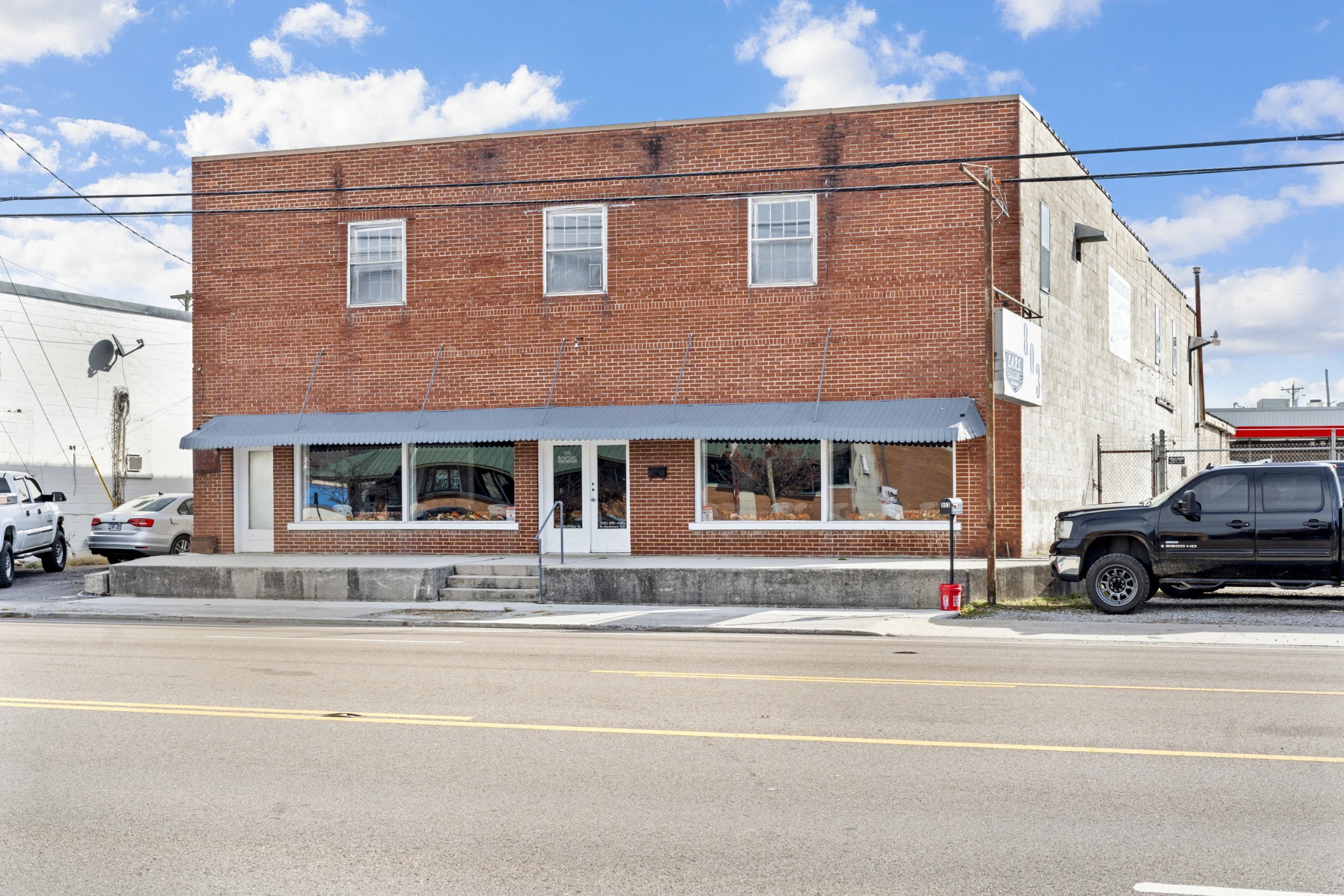 803 McArthur Street Manchester, TN 37355 - Photo 2 of 31 a view of a building and car parked on the street