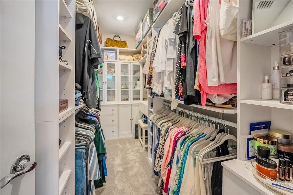 8344 Southwest 54th Loop Ocala, FL 34481 - Photo 15 of 36 a view of walk in closet with clothes and shoes