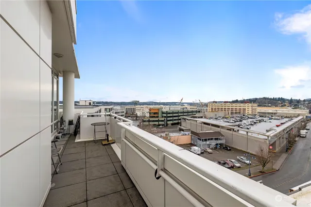 a lobby with furniture and a potted plant