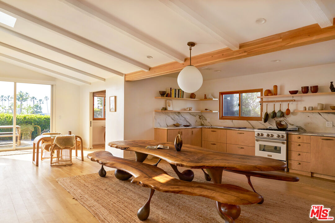 29500 Heathercliff Road, Unit 288 Malibu, CA 90265 - Photo 5 of 26 a workspace with wooden floor
