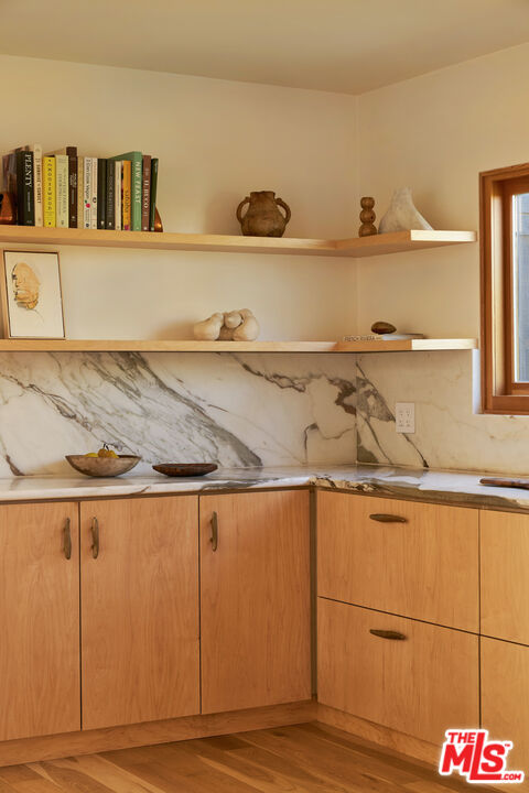 29500 Heathercliff Road, Unit 288 Malibu, CA 90265 - Photo 8 of 26 a view of a kitchen with wooden floor