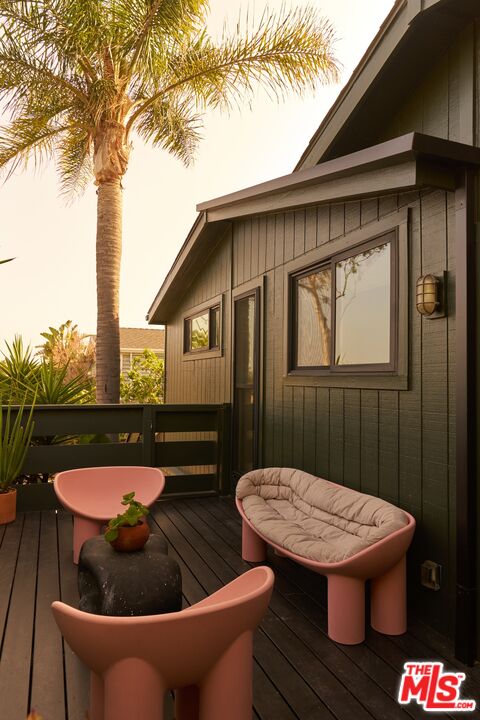 29500 Heathercliff Road, Unit 288 Malibu, CA 90265 - Photo 10 of 26 a view of a balcony with chair and table