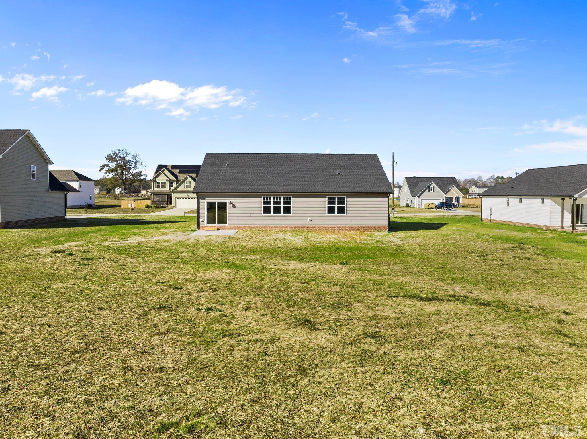 9695 Chapman Road Bailey, NC 27807 - Photo 23 of 26 a view of a swimming pool with an ocean view