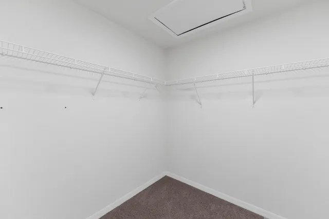 a view of a room with racks on the wall