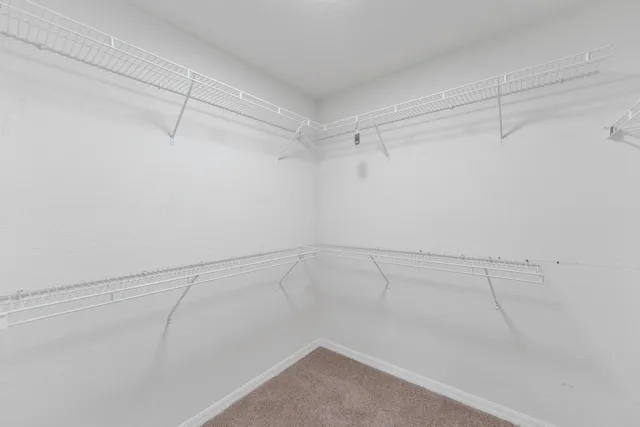 a view of a room with racks on the wall