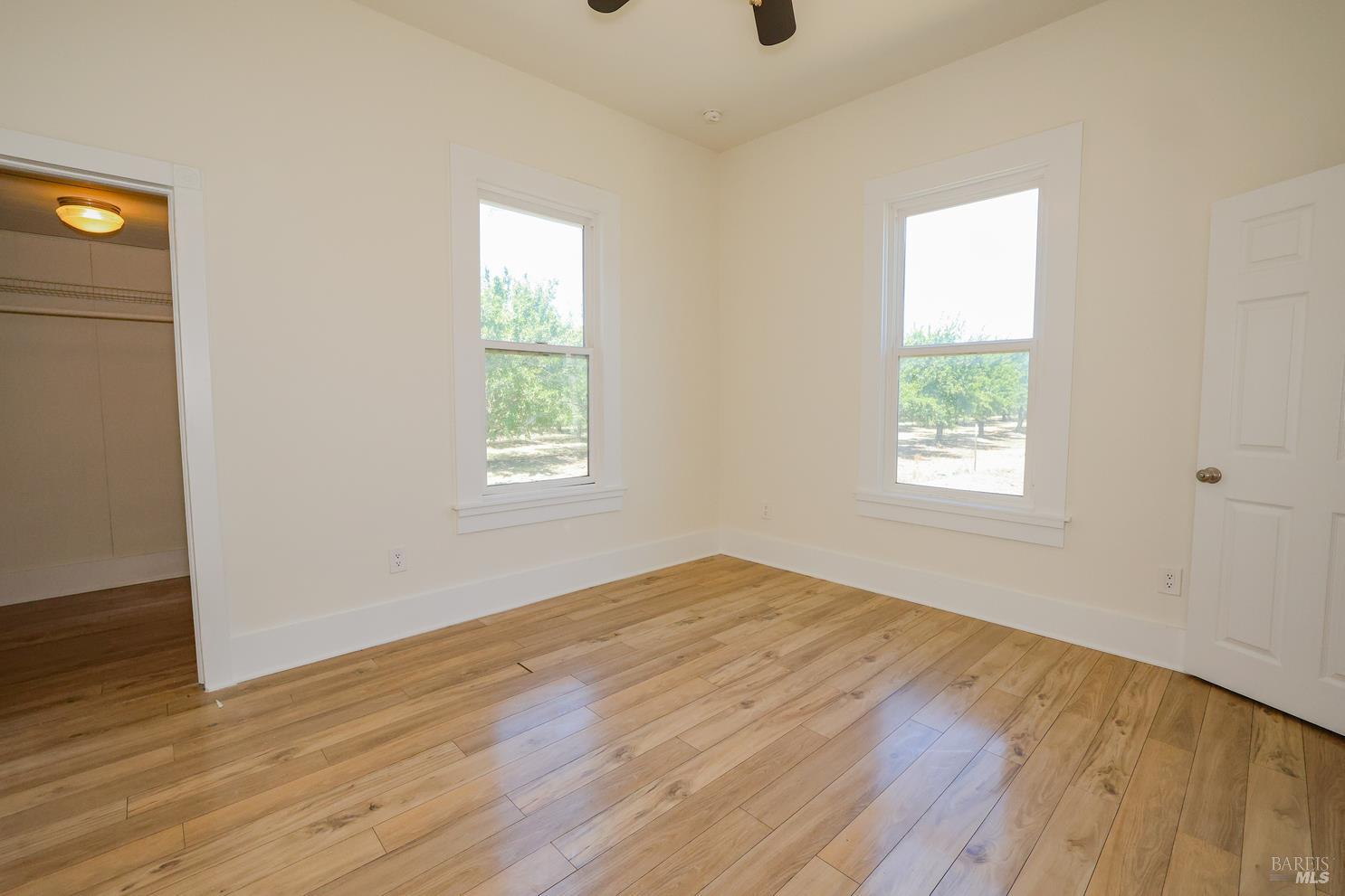 7948 North Meridian Road Dixon, CA 95620 - Photo 22 of 59 wooden floor in an empty room with a window