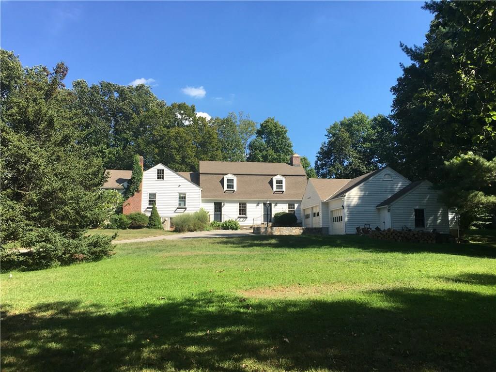 15 Partrick Lane Wilton, CT 06897 - Photo 1 of 1 a front view of house with yard and green space