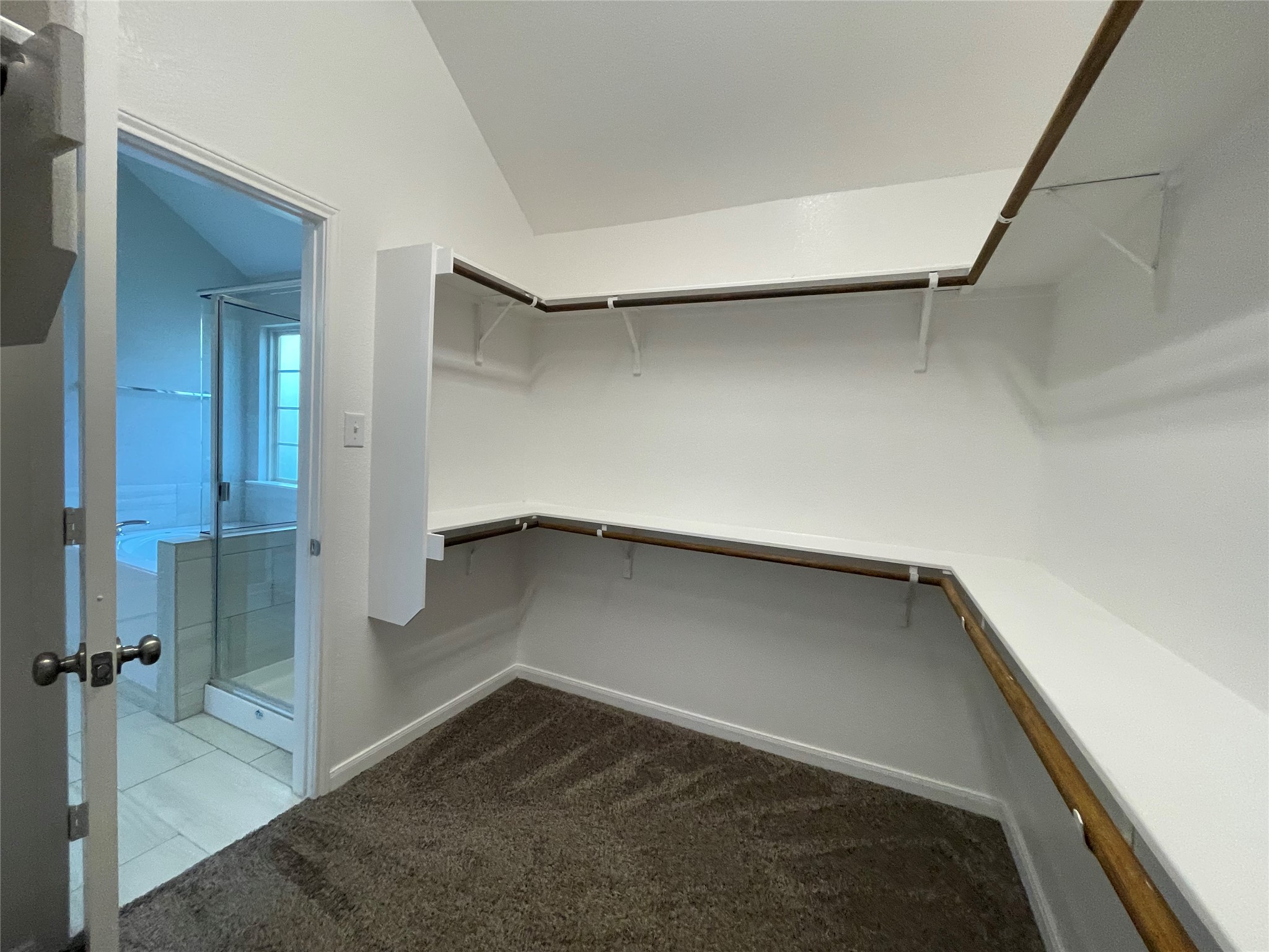 8113 Northgate Loop Temple, TX 76502 - Photo 27 of 35 Spacious walk-in closet featuring built-in shelving and clothing rods