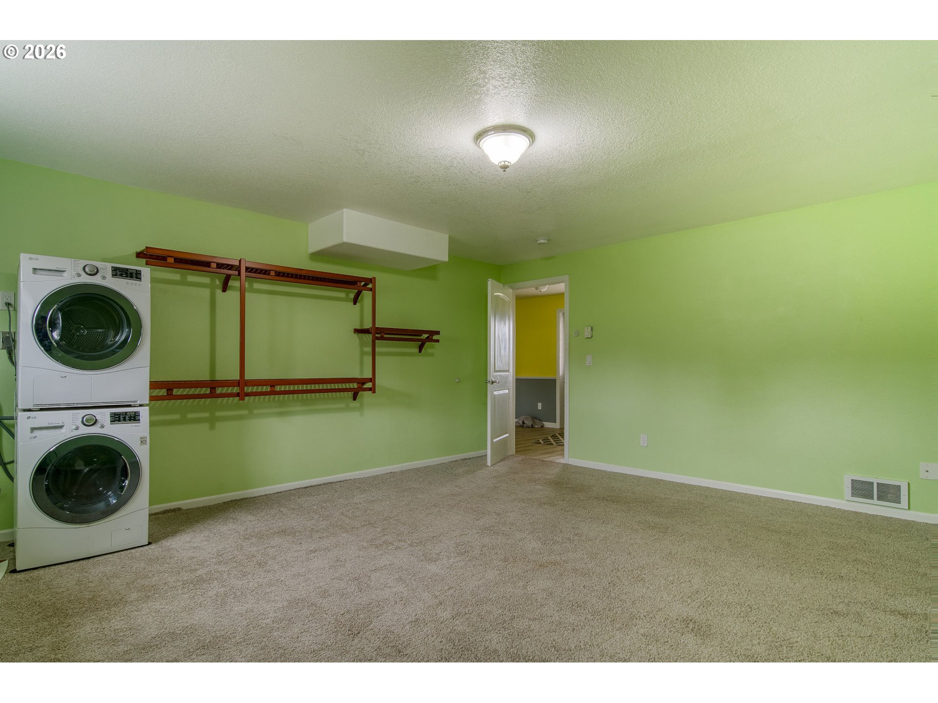 35432 Spence Street St. Helens, OR 97051 - Photo 30 of 48 a view of storage and utility room with washer and dryer