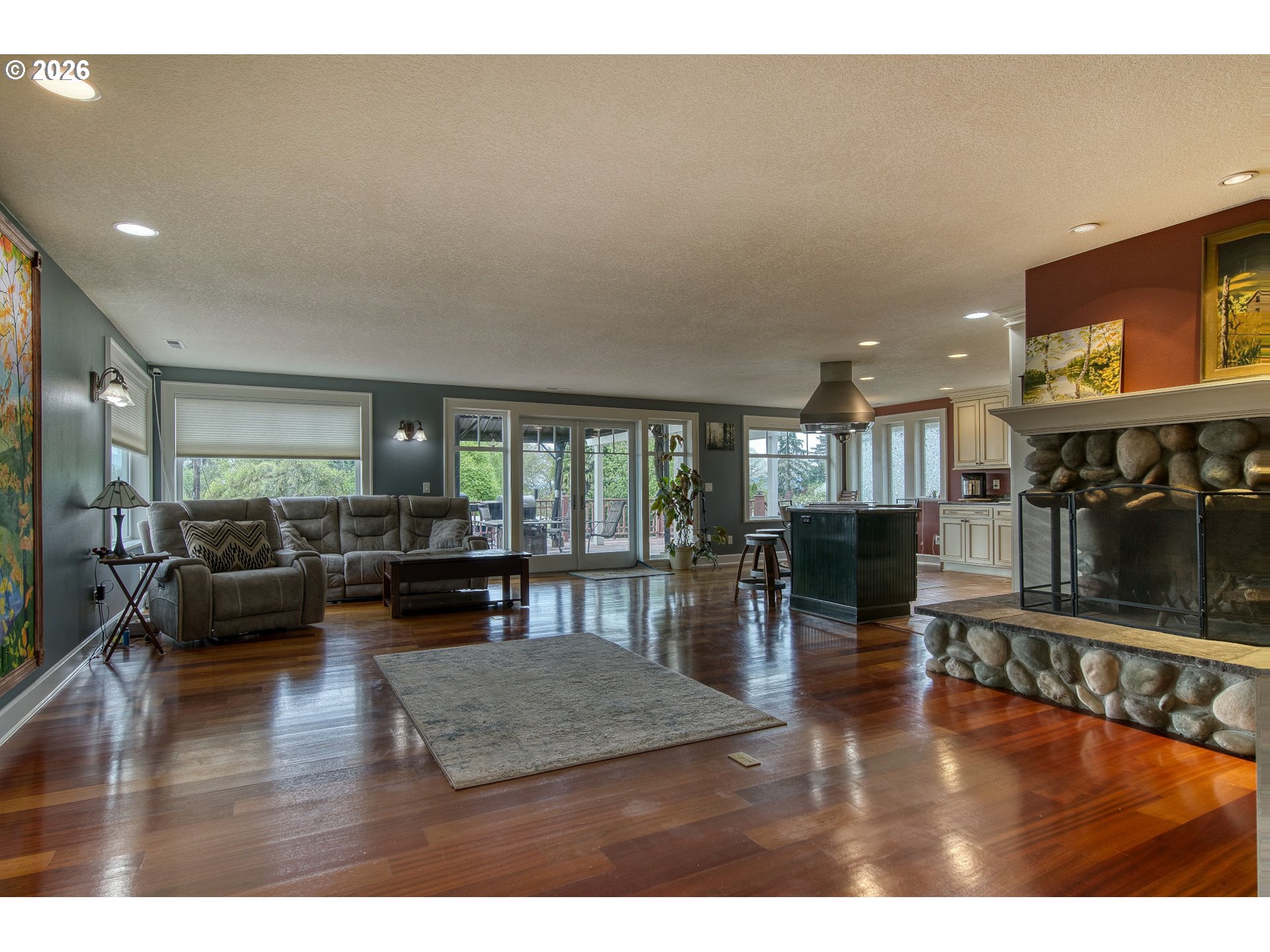 35432 Spence Street St. Helens, OR 97051 - Photo 4 of 48 a living room with furniture large window and wooden floor